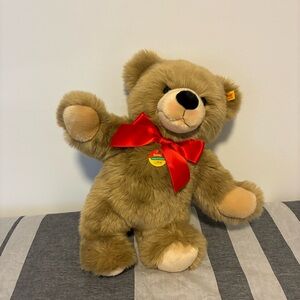 Steiff Bobby cosy friend bear: Classic Brown Teddy w/ Red Bow. famous German co